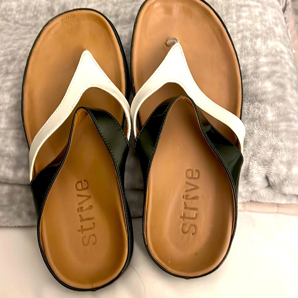 Strive Yoto sandals. Never worn.  Comfortable and adorable!